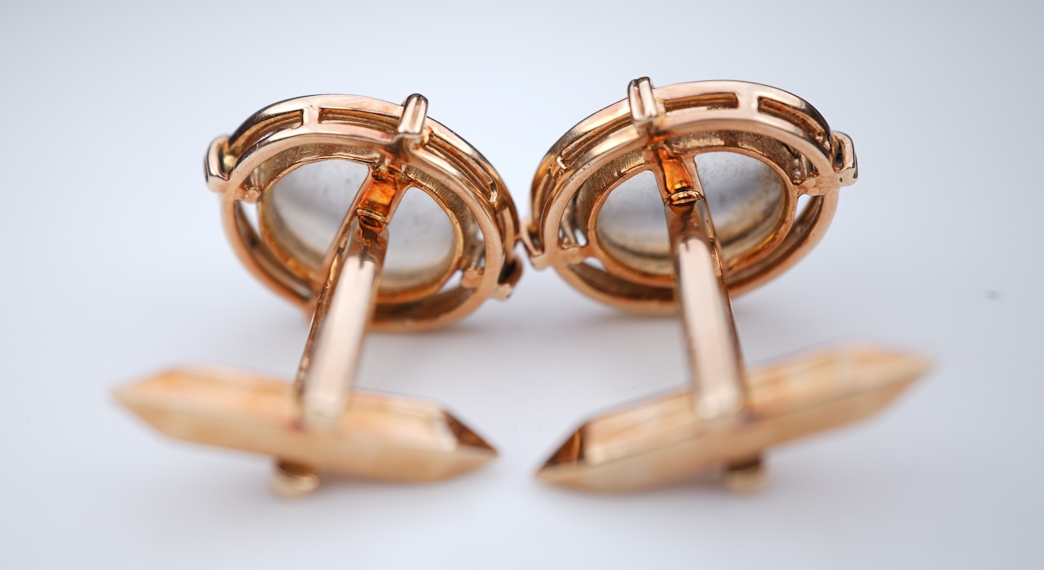 A pair of moonstone cufflinks